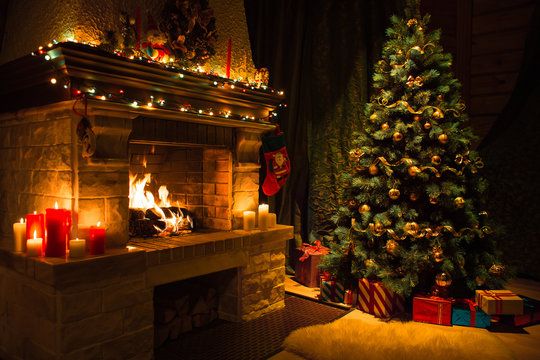 Warm decorated fireplace burning in a Brooklyn home